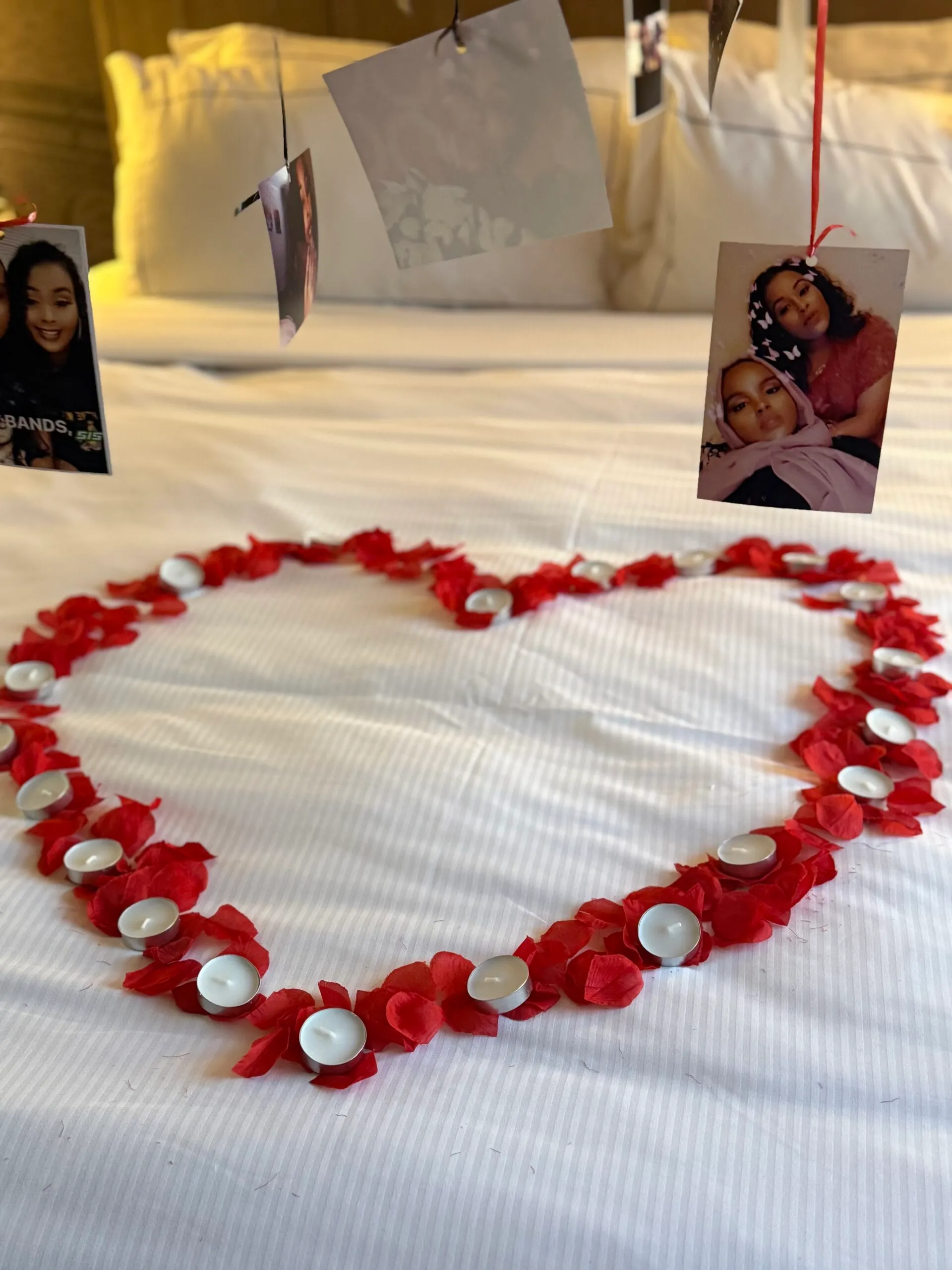 Hotel room styled with balloons and candles