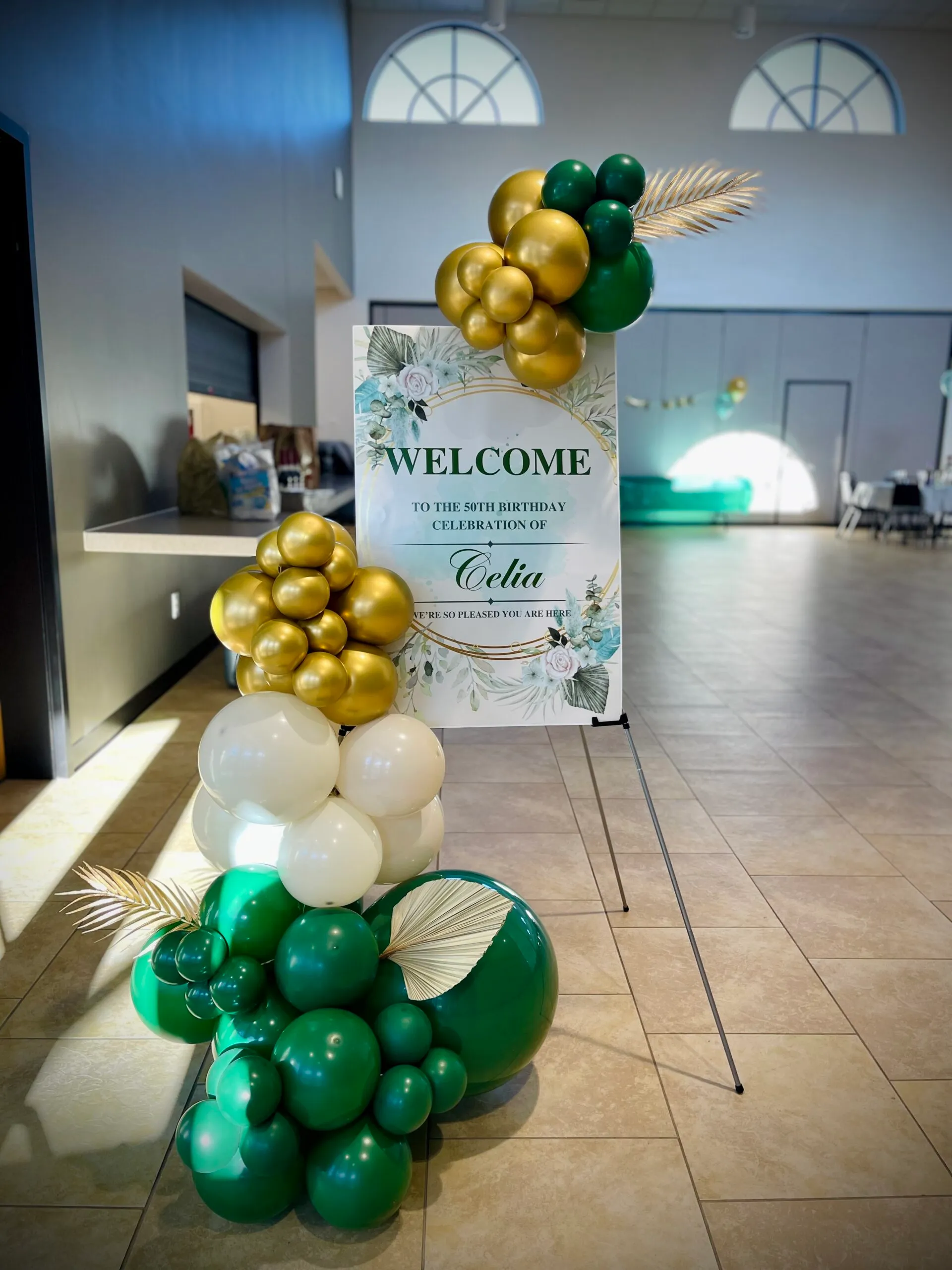 Custom welcome sign with balloon accents