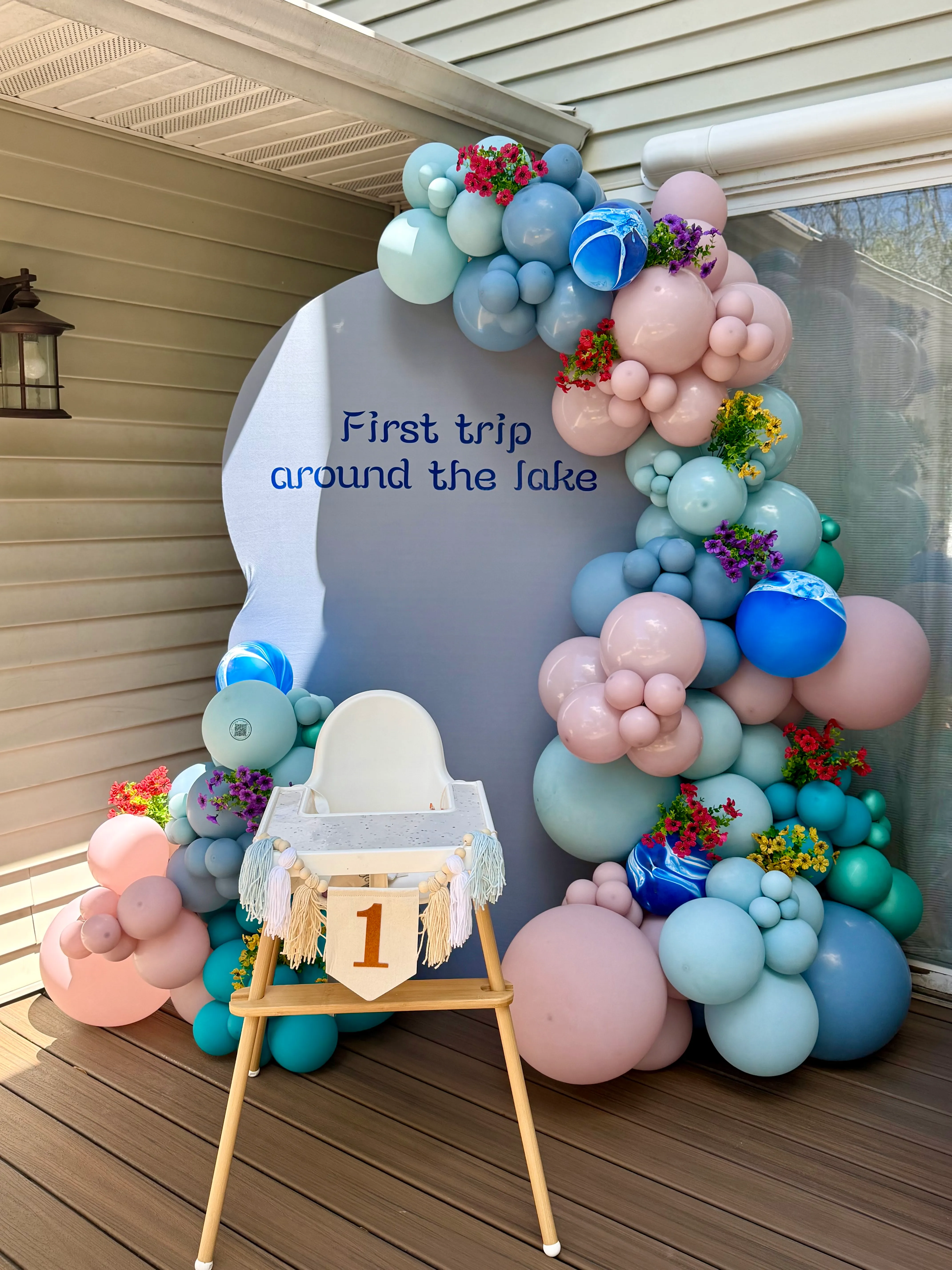 Balloon garland and backdrop styled for a celebration