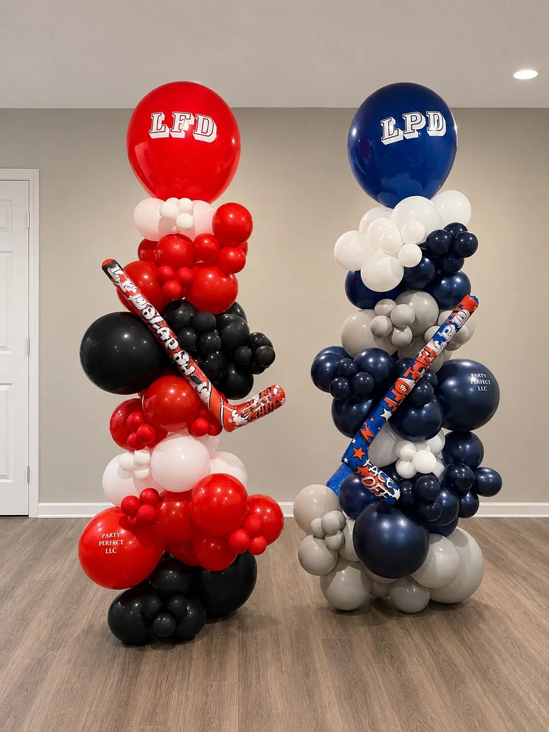 Red and navy LFD and LPD balloon columns with hockey stick accents